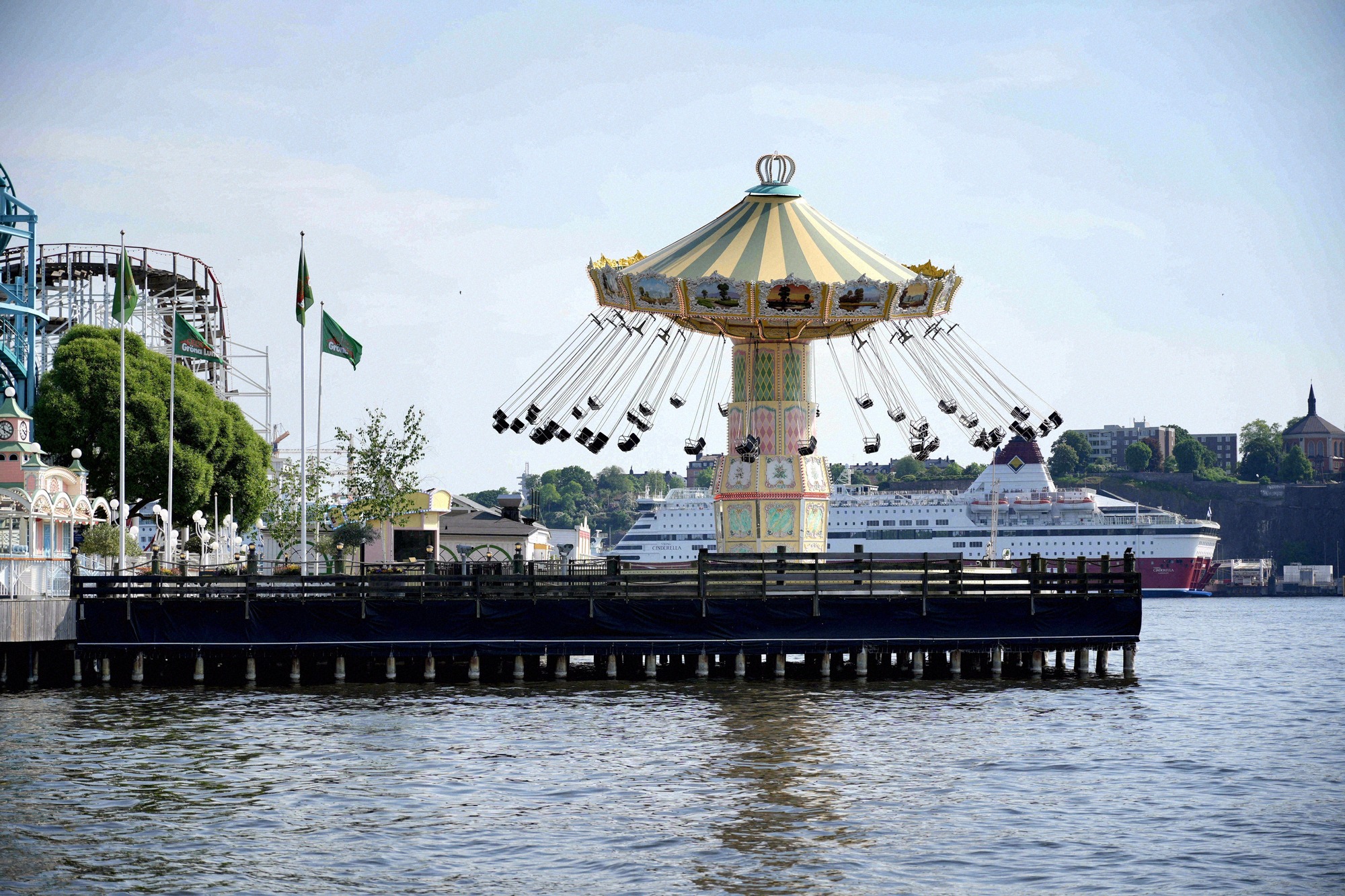 View from the water of the chain carousel and roller coaster at Gröna Lund amusement park on Djurgården.