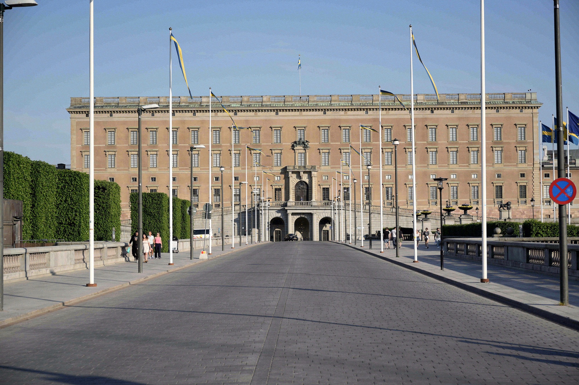 The north facade of the palace, seen from Norrbro. View from Norrbro of the north facade of the Royal Palace with Swedish flags