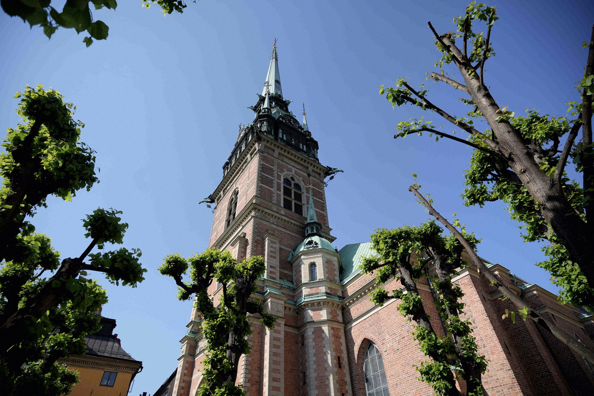 The 19th-century cast-iron spire. Riddarholmen Church seen from below, showing the open-lattice cast-iron spire